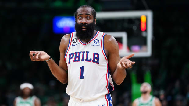 Philadelphia 76ers guard James Harden questions a foul call.